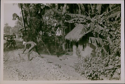 #ad GA61 1920s Original Photo INDIGENOUS VILLAGE PEOPLE Man Working In Dirt Near Hut $20.00