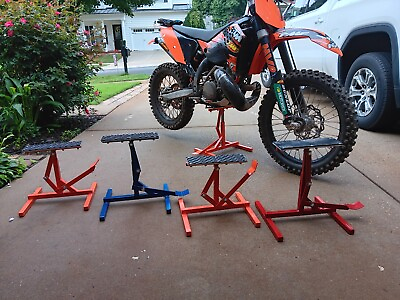 Easy Lift Dirt Bike Stands  New Colors to match your bran red orange blue . $65.00